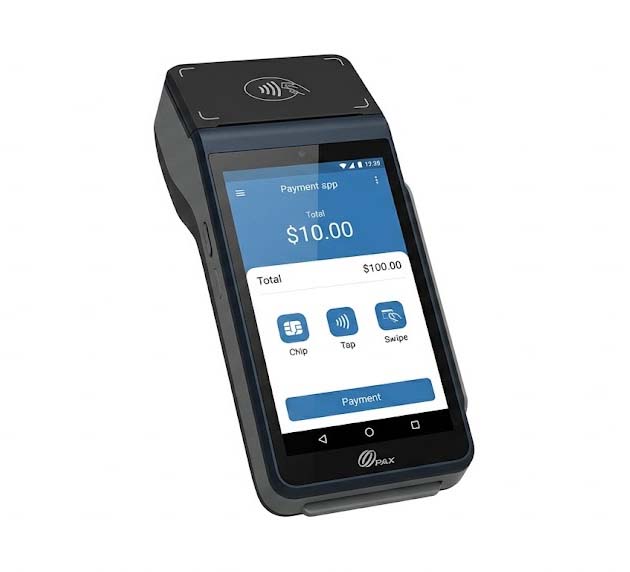 Salon credit card processing terminal displaying a balance due on the screen